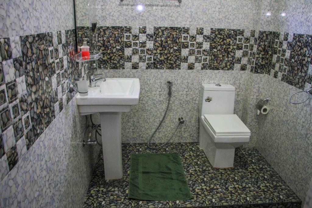 Koupelna v ubytování Miracle Home Stay
