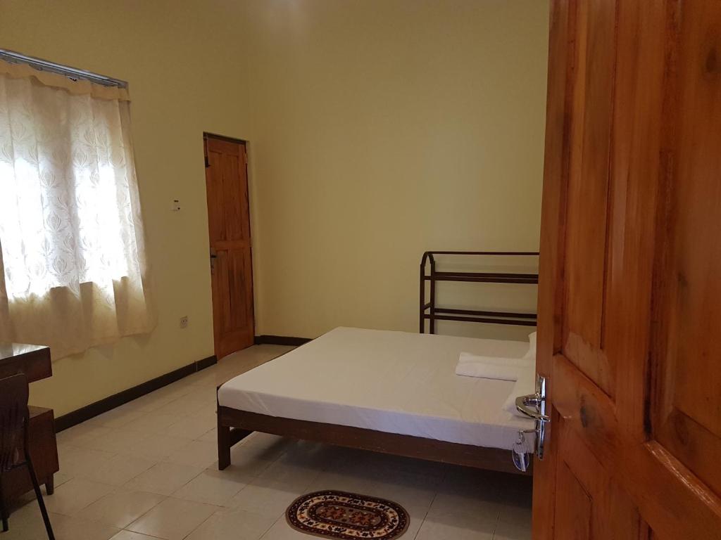 Postel nebo postele na pokoji v ubytování No 51, Menik Home Rest
