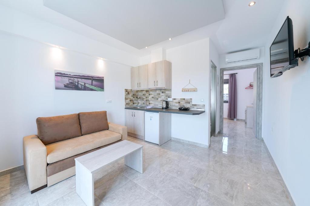 Kuchyň nebo kuchyňský kout v ubytování Eridon Suites