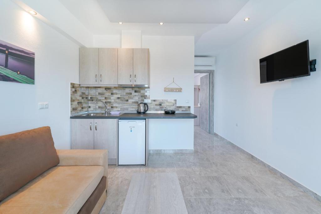Kuchyň nebo kuchyňský kout v ubytování Eridon Suites