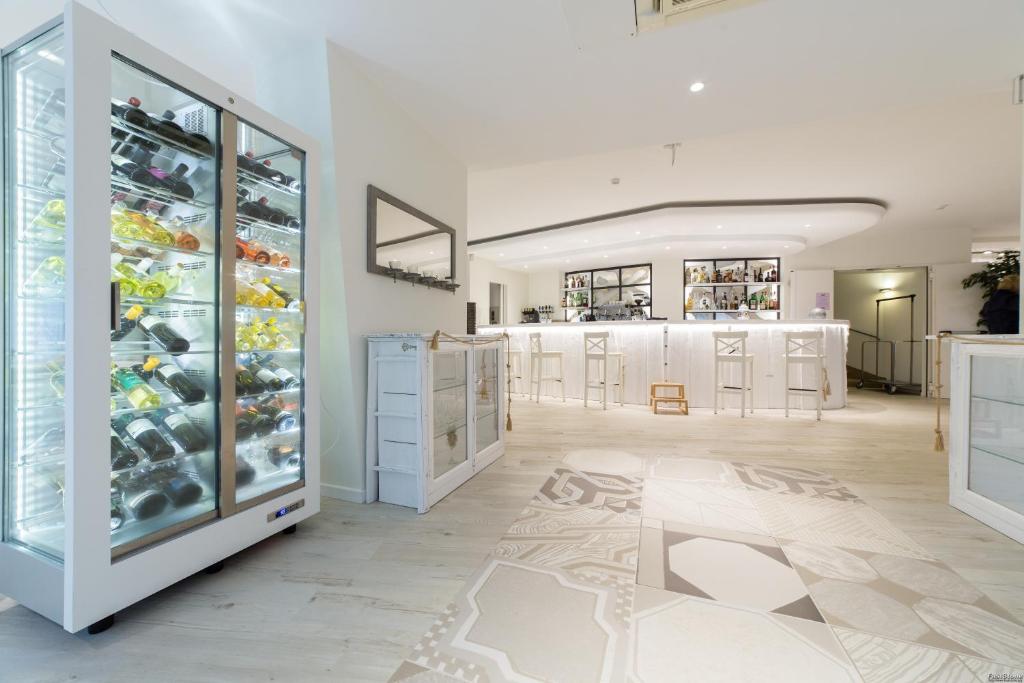 Kuchyň nebo kuchyňský kout v ubytování Hotel Solemare