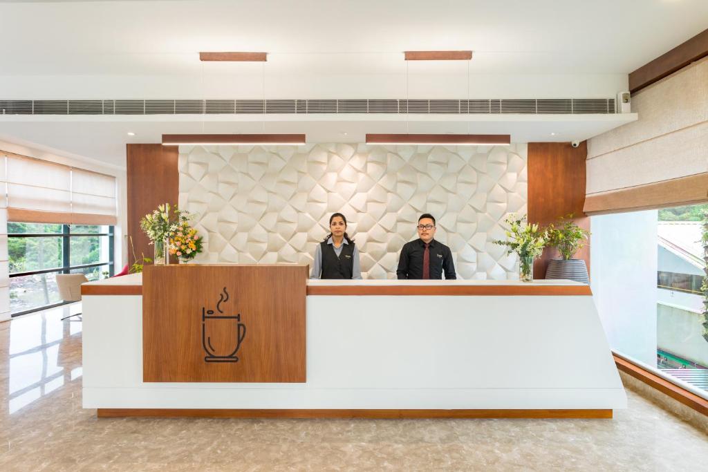 Členové personálu v ubytování Sugar Business Hotel