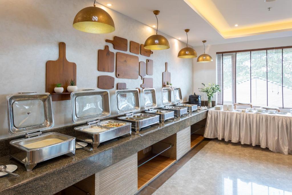 Kuchyň nebo kuchyňský kout v ubytování Sugar Business Hotel