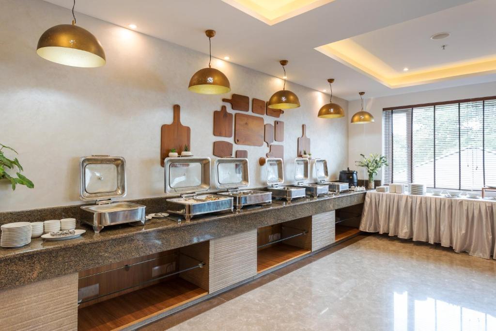 Kuchyň nebo kuchyňský kout v ubytování Sugar Business Hotel
