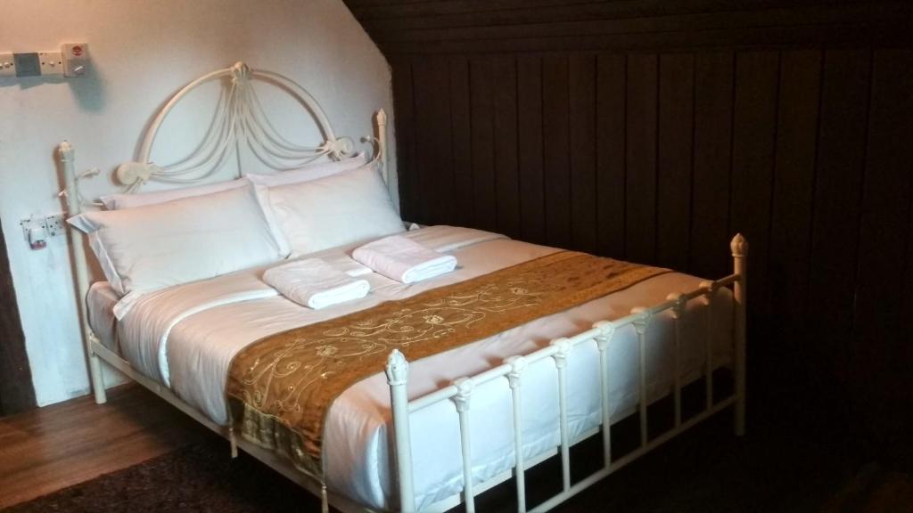 Postel nebo postele na pokoji v ubytování Bayu Lestari Island Resort
