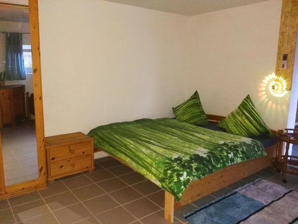 Ein Bett oder Betten in einem Zimmer der Unterkunft Ferienwohnungen mit Weitblick