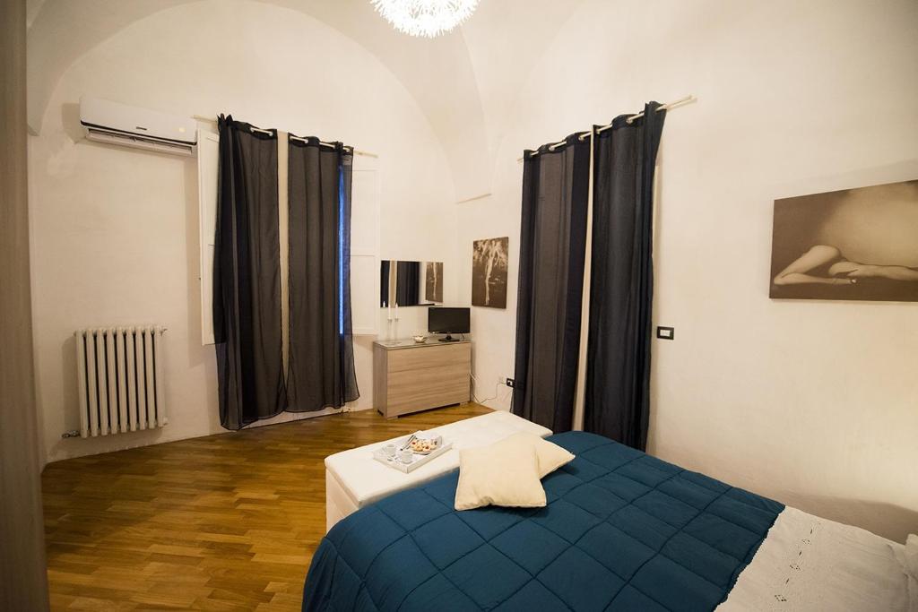 Postel nebo postele na pokoji v ubytování B&B IL SEGRETO