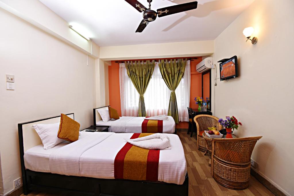 Postel nebo postele na pokoji v ubytování Hotel Pleasure Home
