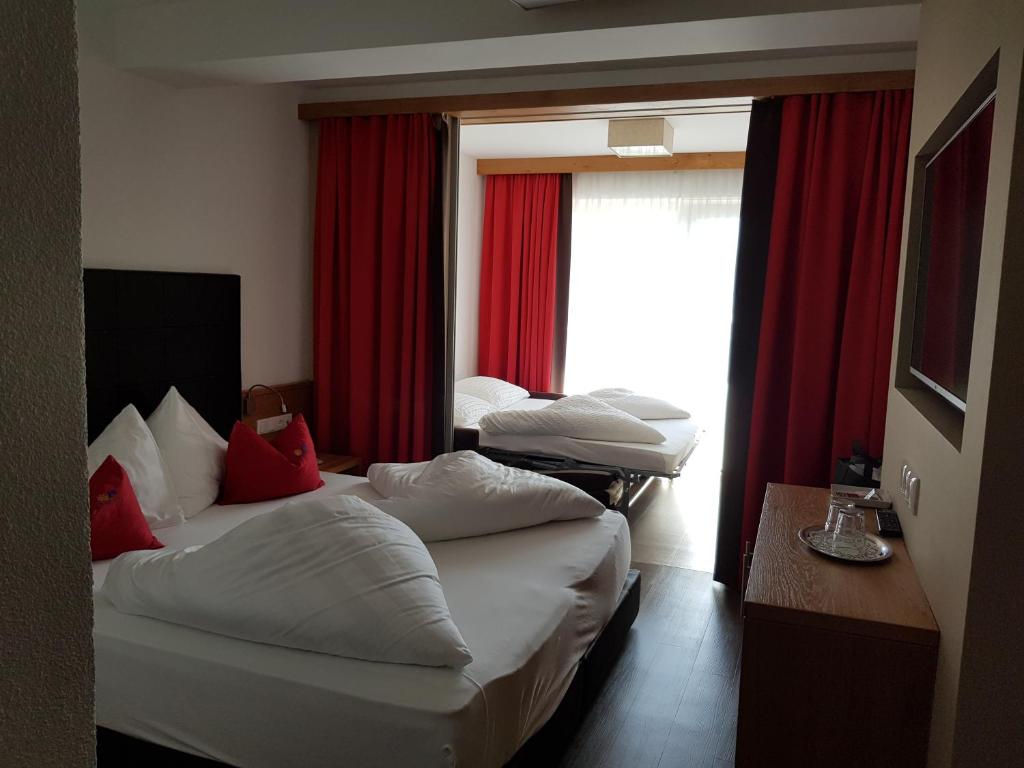 Posteľ alebo postele v izbe v ubytovaní Hotel Sonnleiten