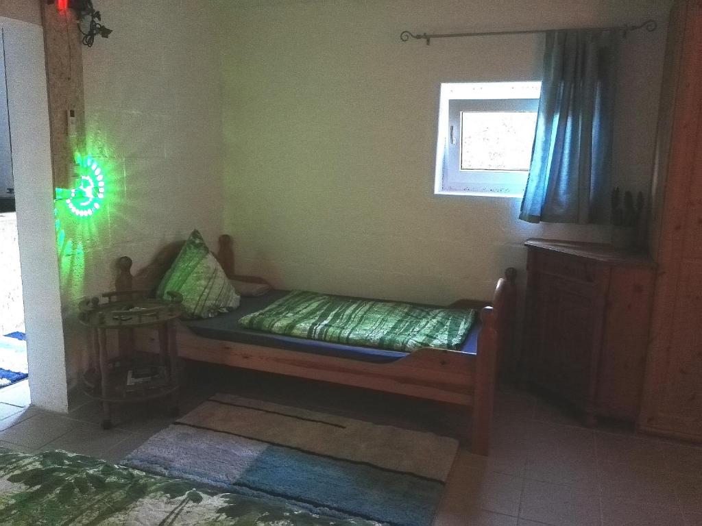 Ein Bett oder Betten in einem Zimmer der Unterkunft Ferienwohnungen mit Weitblick