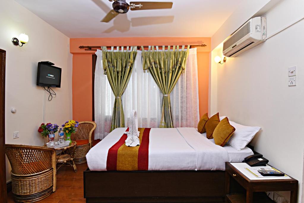 Postel nebo postele na pokoji v ubytování Hotel Pleasure Home
