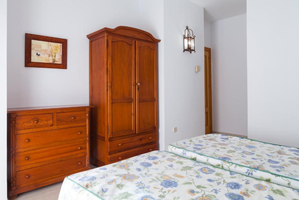 Posteľ alebo postele v izbe v ubytovaní Apartamentos Mexico