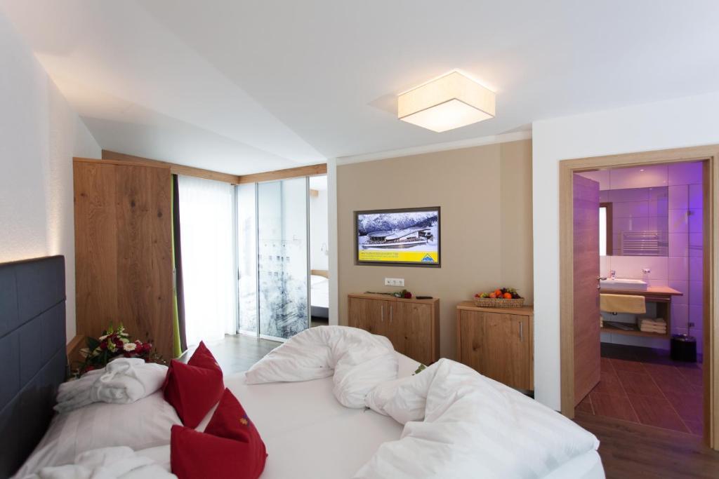 Posteľ alebo postele v izbe v ubytovaní Hotel Sonnleiten