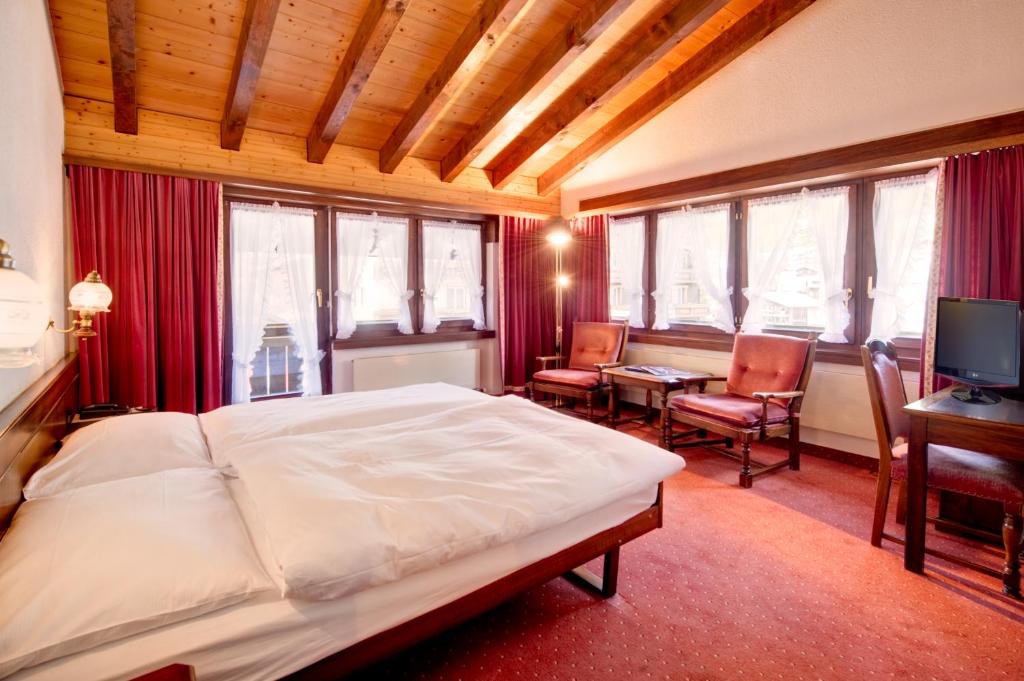 Letto o letti in una camera di Hotel Astoria