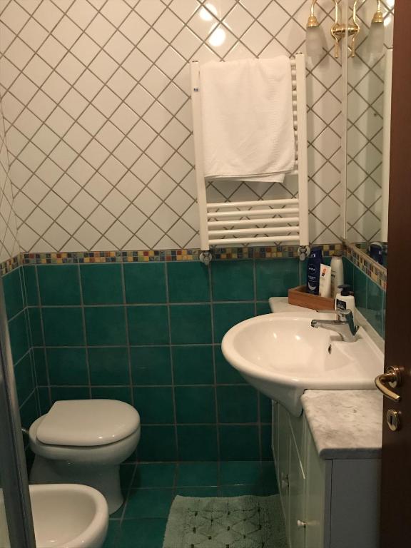 Koupelna v ubytování Pompei Home Apartament