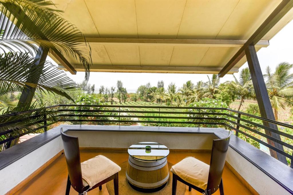 Balkón nebo terasa v ubytování Regenta Resort Soma Vine Village Nashik
