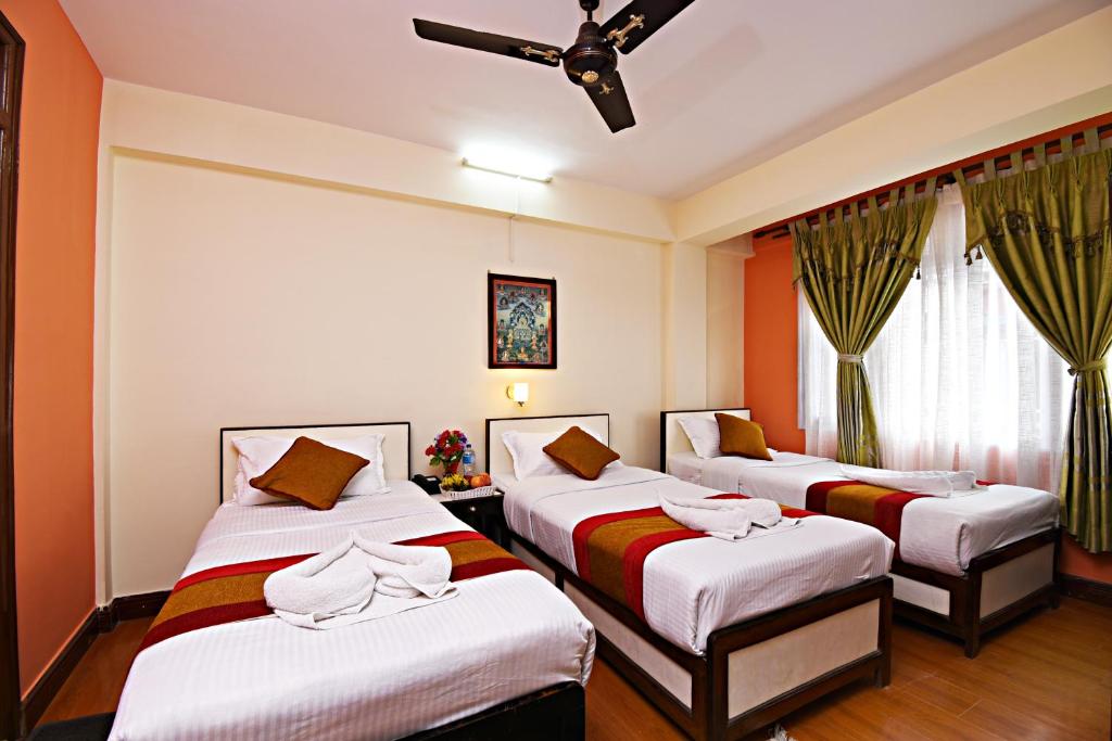 Postel nebo postele na pokoji v ubytování Hotel Pleasure Home