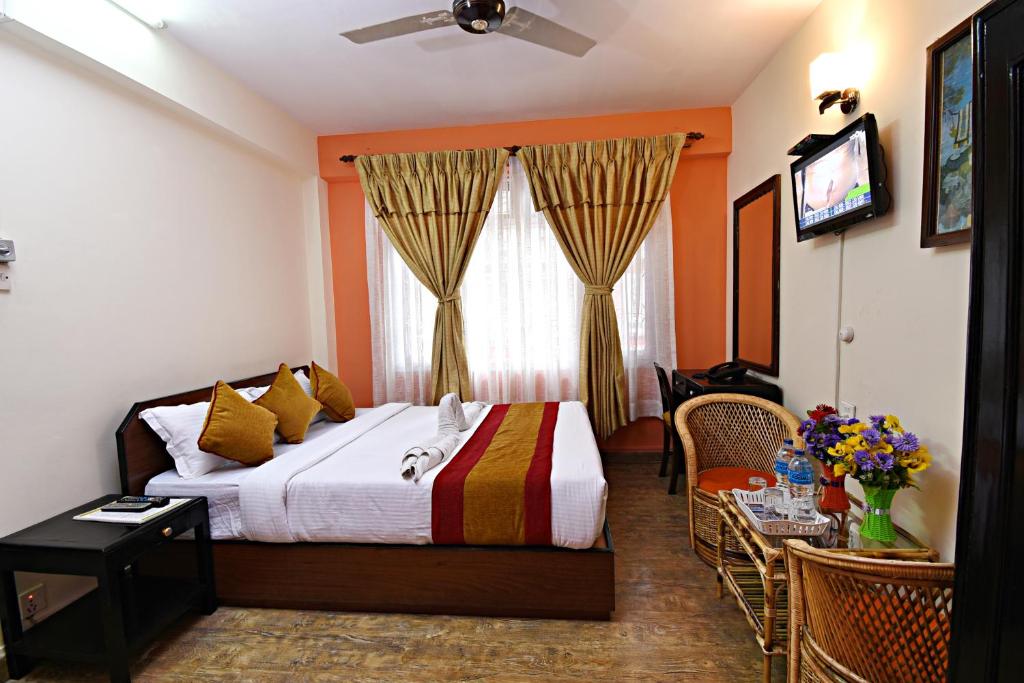 Postel nebo postele na pokoji v ubytování Hotel Pleasure Home
