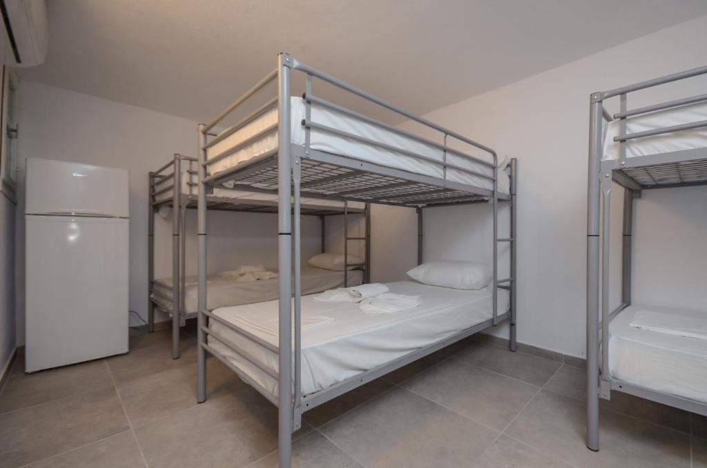 Postel nebo postele na pokoji v ubytování Naxos Hostel
