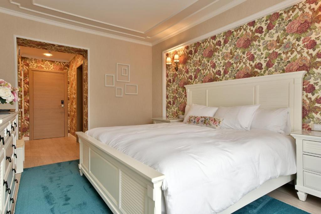 Postel nebo postele na pokoji v ubytování Hotel Dragului