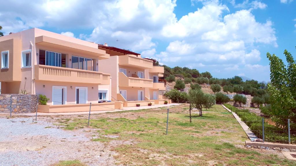 a villa with a view of a building at Creta Spirit in Plakias