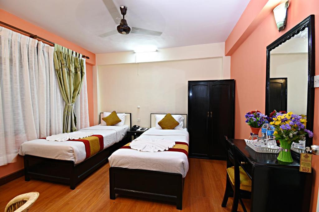 Postel nebo postele na pokoji v ubytování Hotel Pleasure Home
