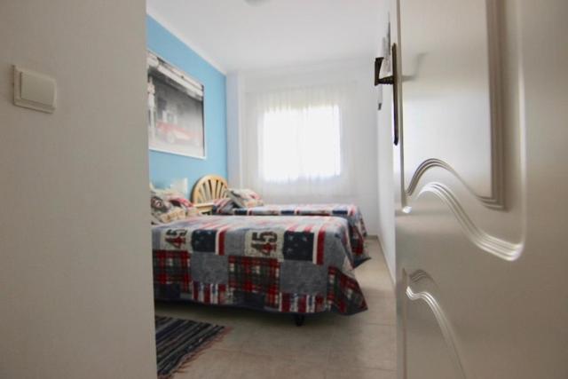 Posteľ alebo postele v izbe v ubytovaní Ático Duplex en 1a línea de mar