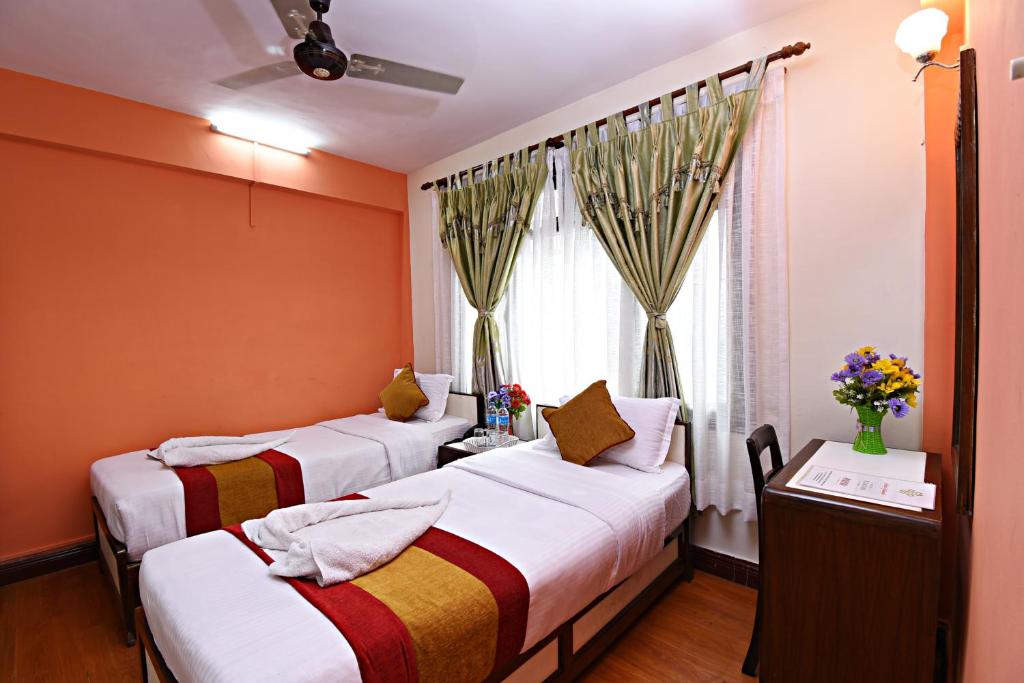 Postel nebo postele na pokoji v ubytování Hotel Pleasure Home