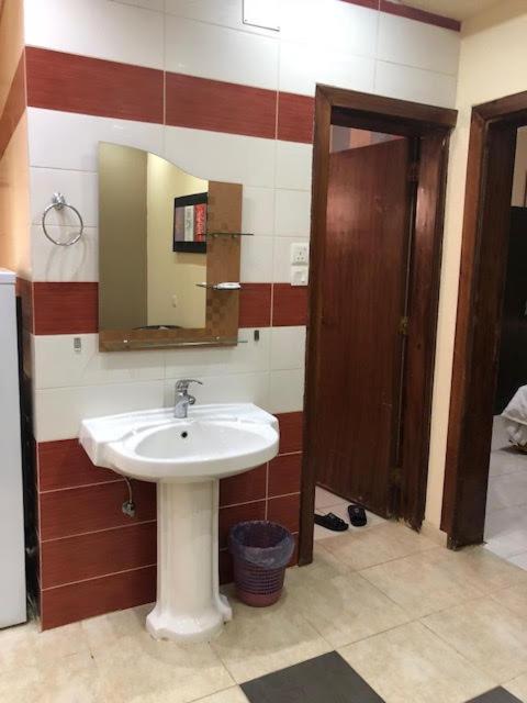 Vannituba majutusasutuses Safwt Aldyar Furnished Units