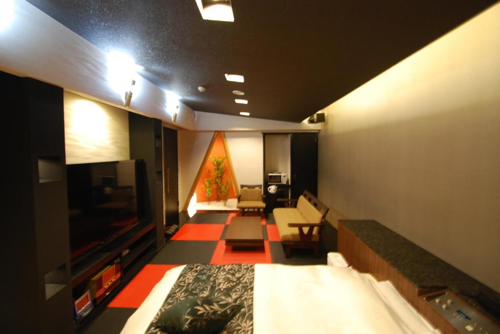 TV a/nebo společenská místnost v ubytování Hotel Free Style Okayama