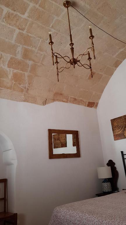 Postel nebo postele na pokoji v ubytování B&B La Sinagoga