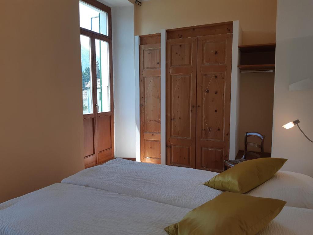 Postel nebo postele na pokoji v ubytování Casa Gialla B&B