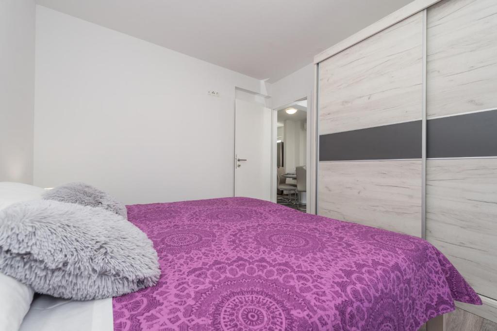 Posteľ alebo postele v izbe v ubytovaní Apartments Janice