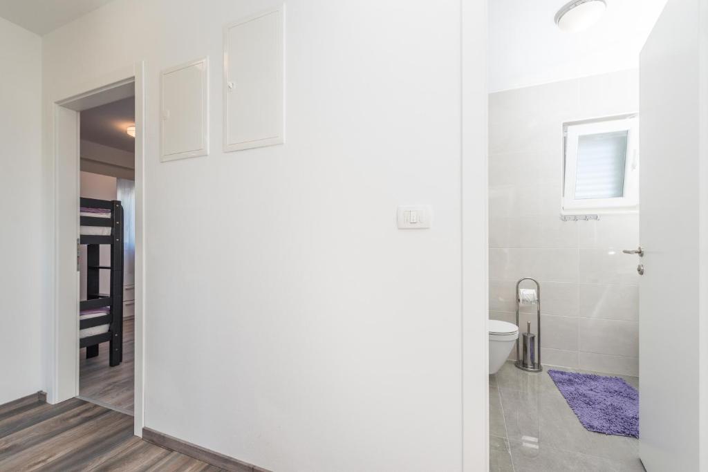 Kúpeľňa v ubytovaní Apartments Janice