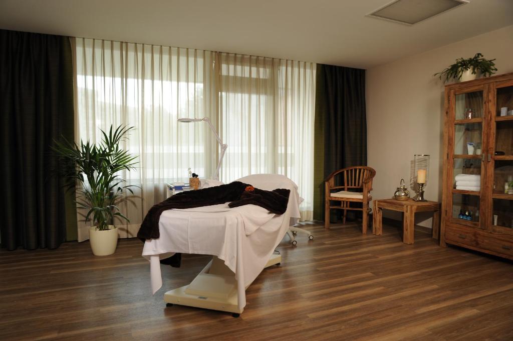 Postel nebo postele na pokoji v ubytování Hotel Sonnenhügel