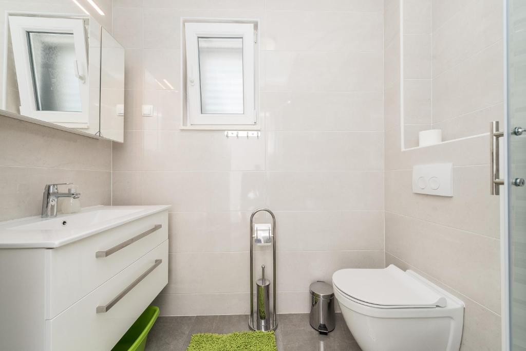 Kúpeľňa v ubytovaní Apartments Janice