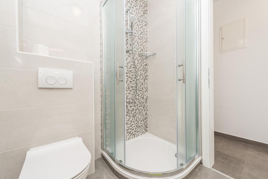 Kúpeľňa v ubytovaní Apartments Janice