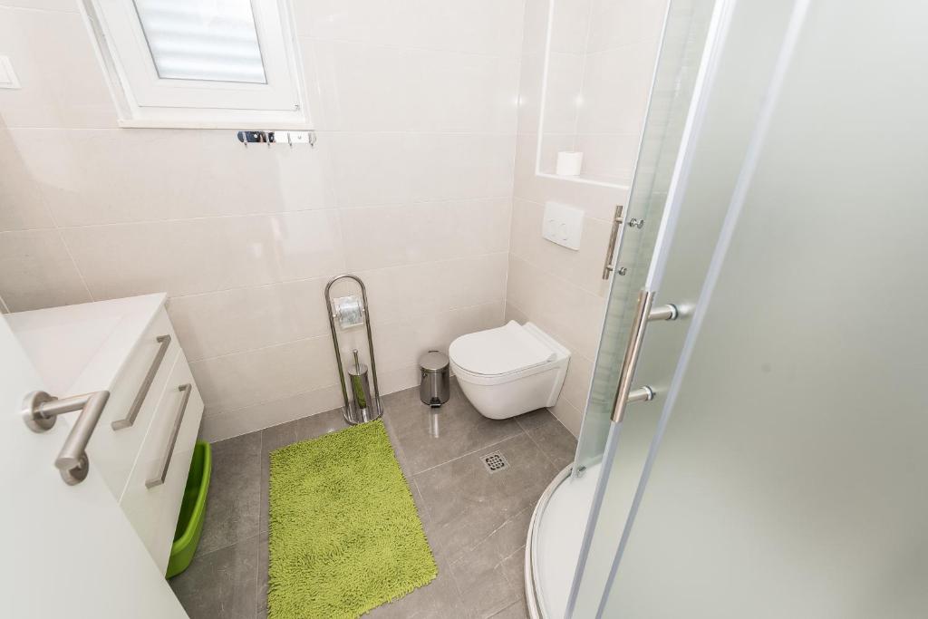 Kúpeľňa v ubytovaní Apartments Janice