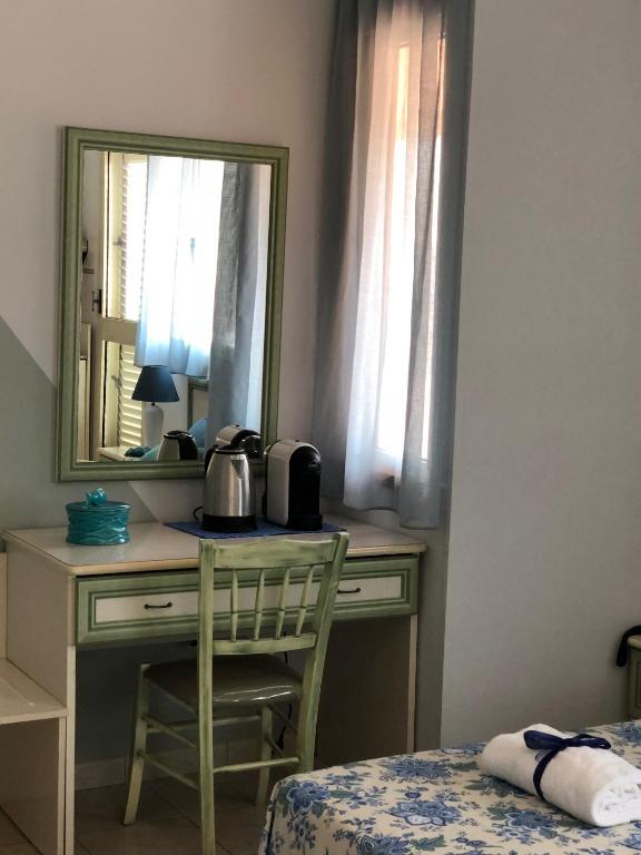 Postel nebo postele na pokoji v ubytování Hotel Due Torri