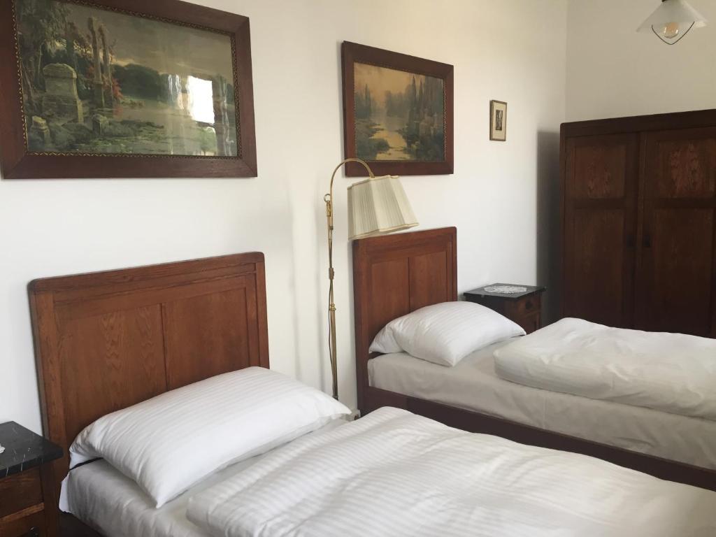 Postel nebo postele na pokoji v ubytování Apartmány PAPÍK
