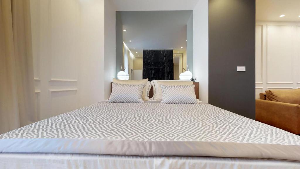 Posteľ alebo postele v izbe v ubytovaní Illyria Luxury Studio Apartments