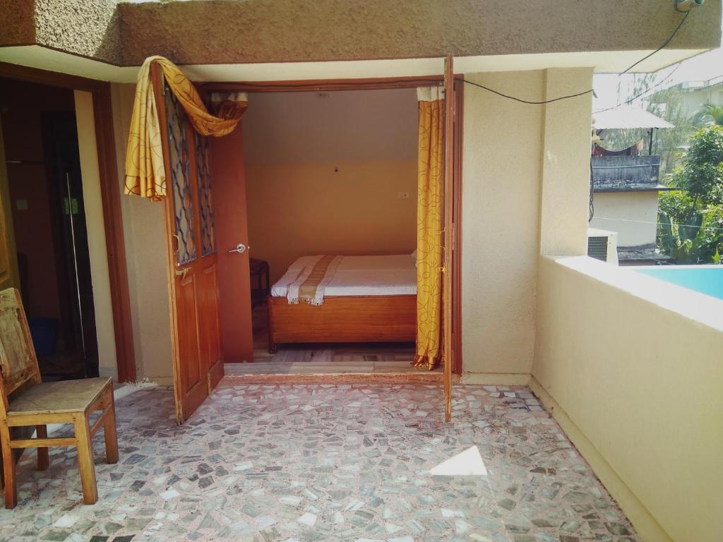 Postel nebo postele na pokoji v ubytování Menezes House