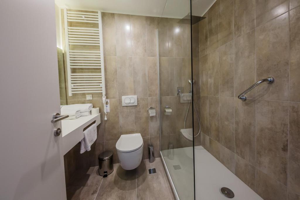 Koupelna v ubytování Hotel Medena