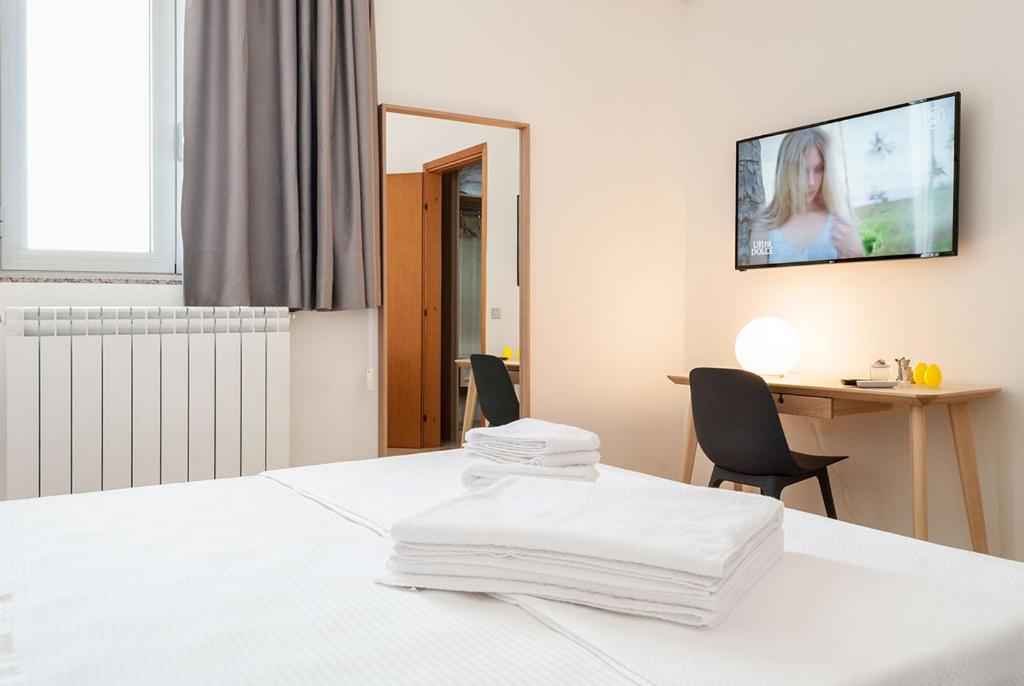 Postel nebo postele na pokoji v ubytování Casa da Ida