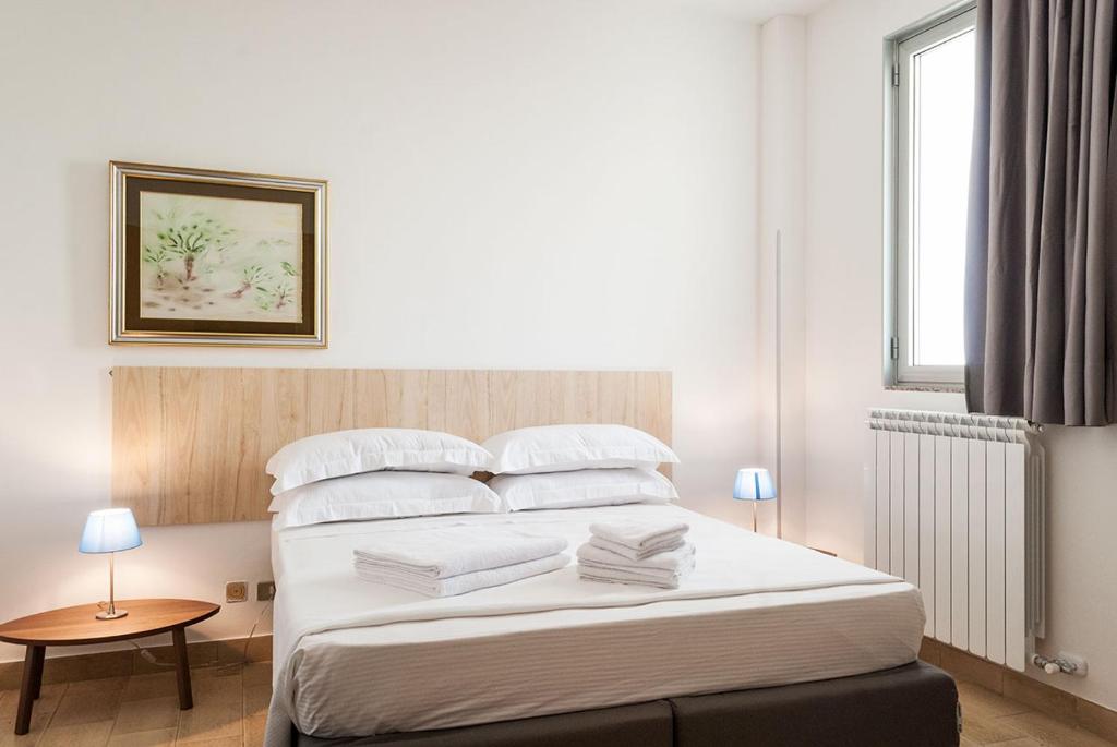 Postel nebo postele na pokoji v ubytování Casa da Ida