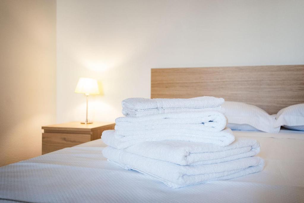 Postel nebo postele na pokoji v ubytování Casa da Ida
