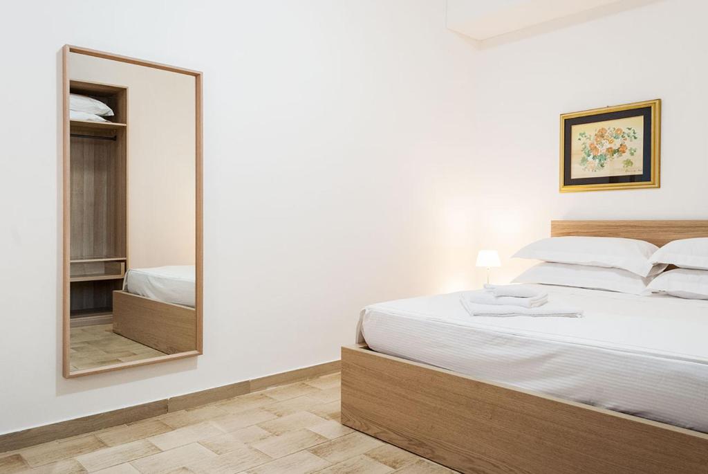 Postel nebo postele na pokoji v ubytování Casa da Ida