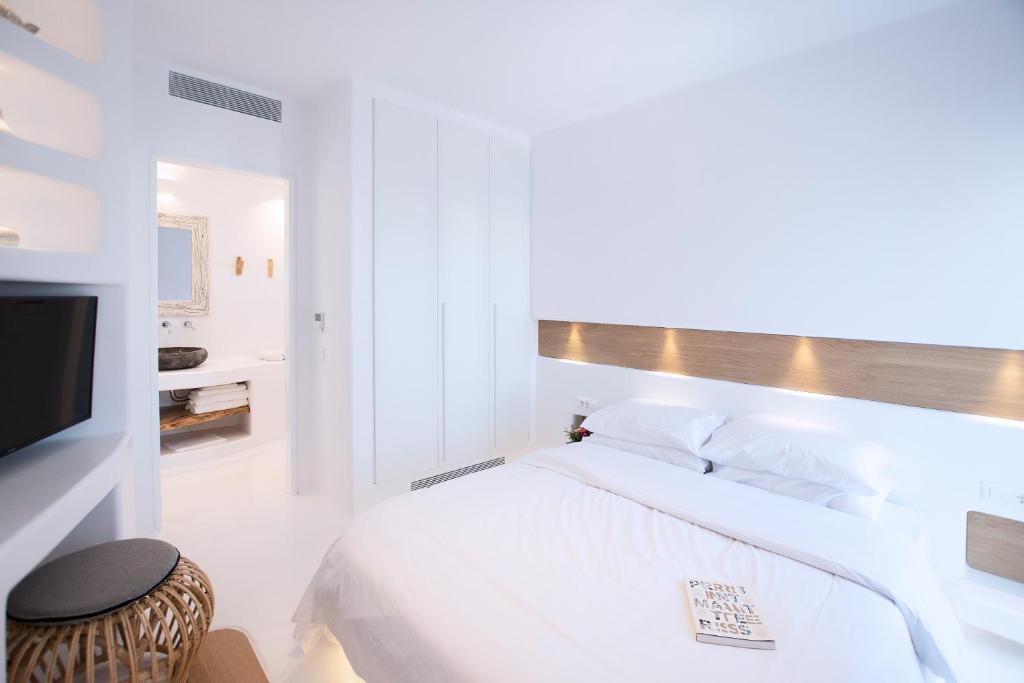Posteľ alebo postele v izbe v ubytovaní Phos Home by Rocks Estates