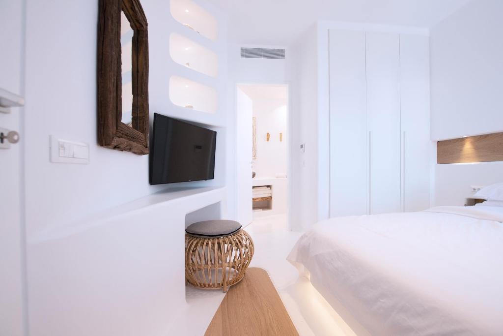 Posteľ alebo postele v izbe v ubytovaní Phos Home by Rocks Estates