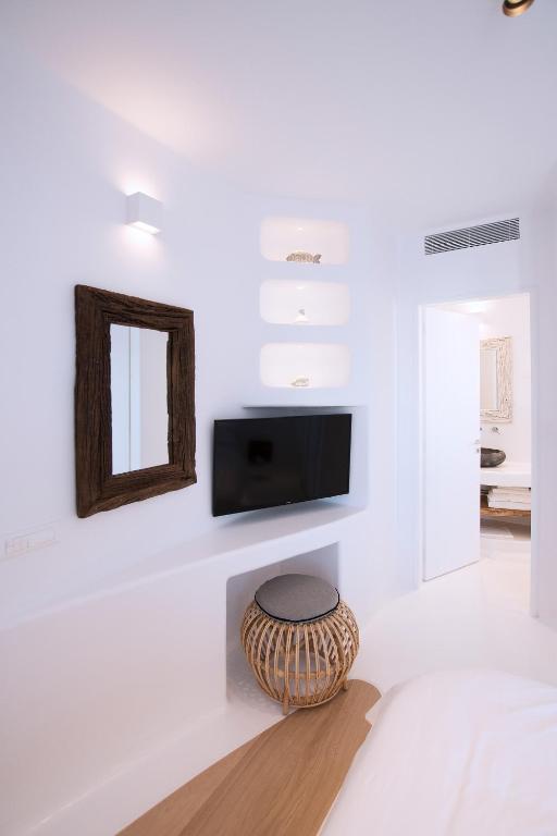 Televízia a/alebo spoločenská miestnosť v ubytovaní Phos Home by Rocks Estates